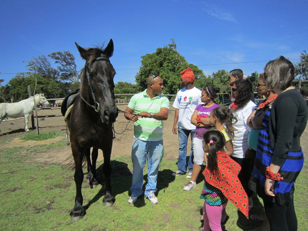 Now the red team learns to saddle the horse